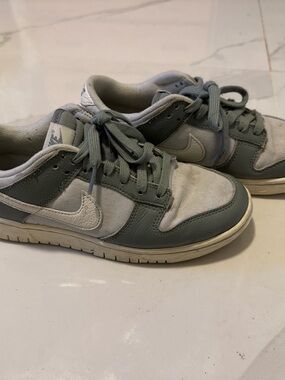 Women’s Grey and White Nike Low-Top Sneakers